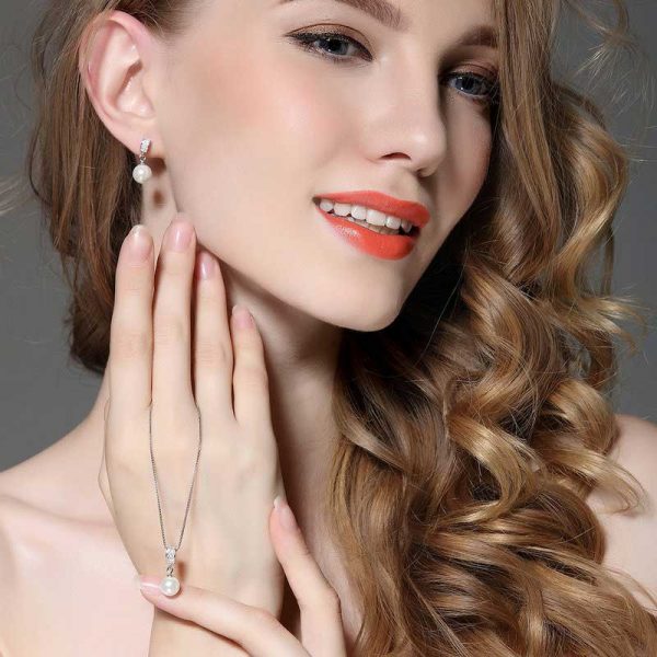 925 silver cz classic pearl drop earrings worn by model