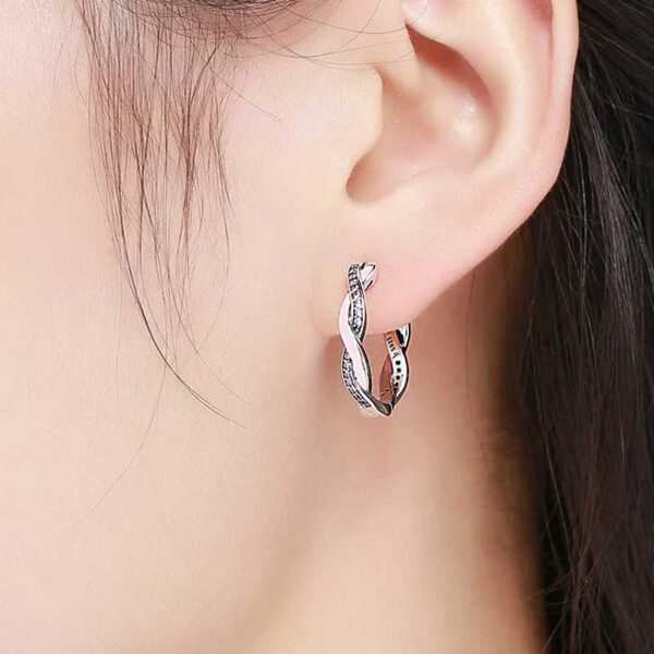 925 Silver Cz Entwined Hoop Earrings Worn By Model
