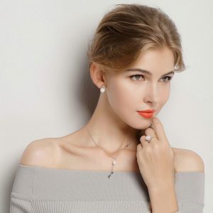 925 silver cz pearl stud earrings worn by model