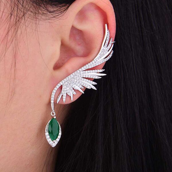 luxury cz feather cuff drop earrings green closeup on ear