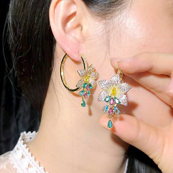 Luxury CZ Flower Tassel Hoop Earrings Worn by Model