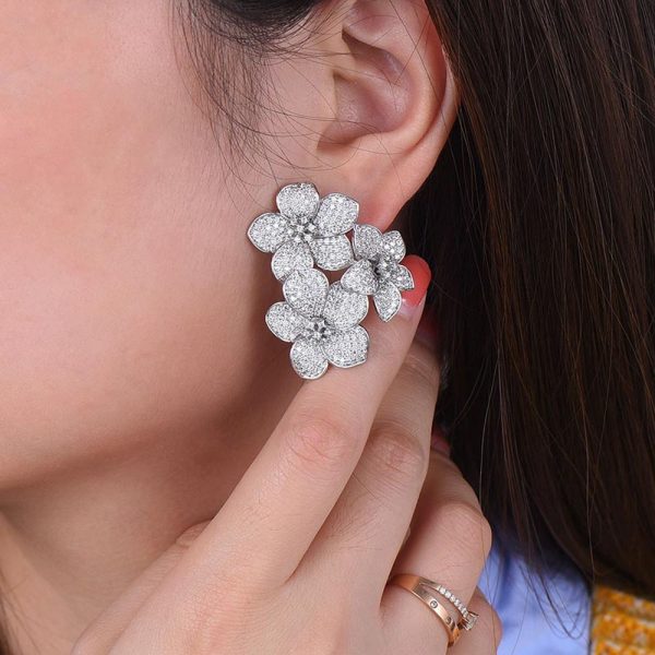 luxury cz large flower stud earrings worn by model