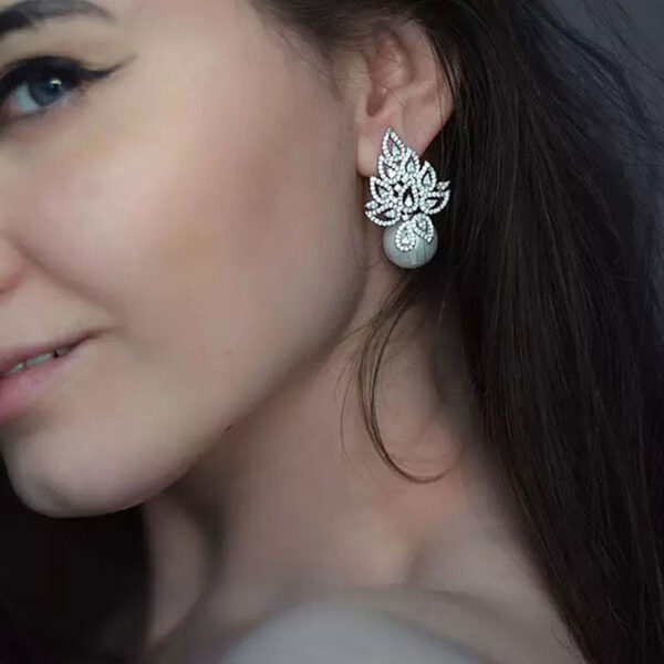 Luxury CZ Pearl Leaf Earrings Worn By Model
