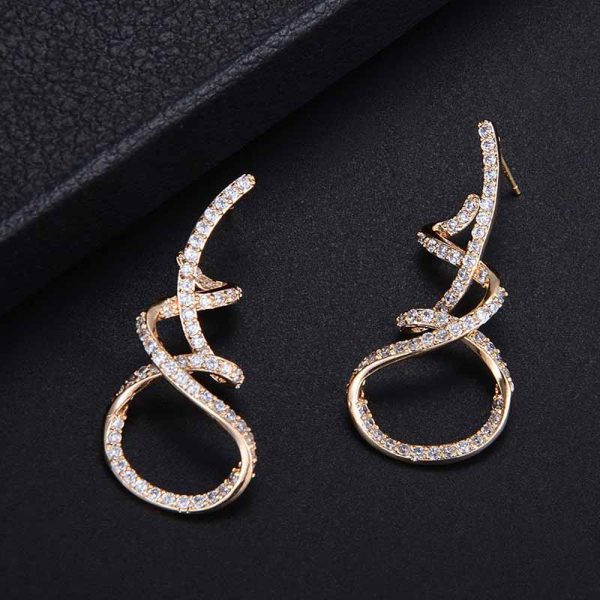 luxury cz twirl earrings gold display