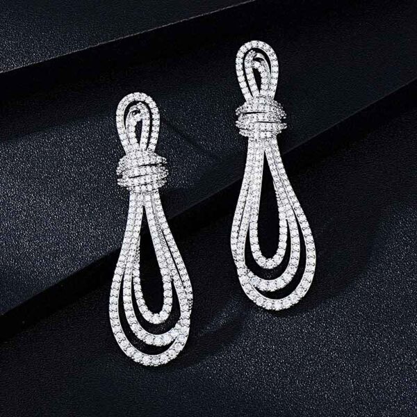 Luxury CZ Twirl Earrings Silver Display