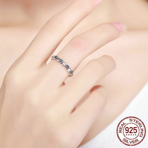 925 sterling silver ring love hearts worn by model closeup